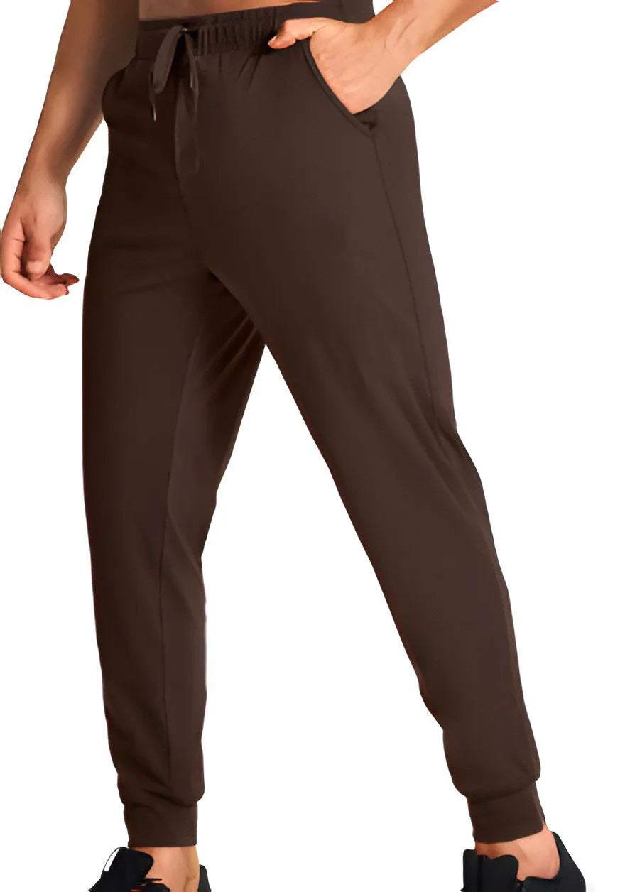 Men's loose fit solid colour casual trousers in polyester, shown in one of thirteen available colour options.