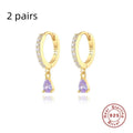 Geometric water drop sterling silver earrings with electroplated finish and sparkling stone detail.