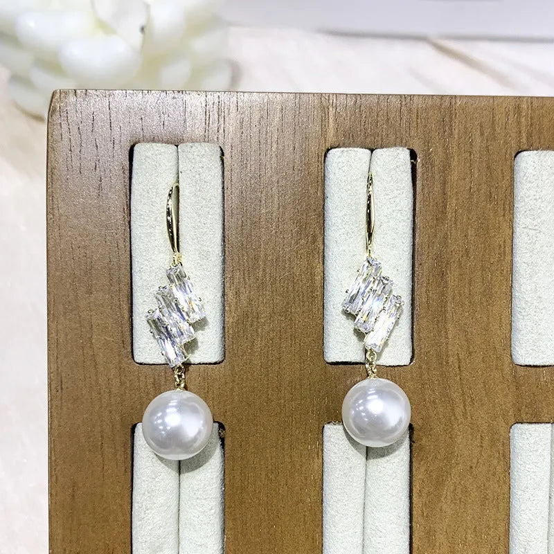 French hook earrings with pearl drop and micro inlaid sparkling diamond accent in Gold or Silvery