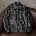 Men's black lapel-collar leather jacket with side pockets shown on model