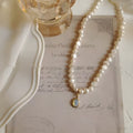 Adjustable vintage pearl necklace with geometry pendant on electroplated alloy chain
