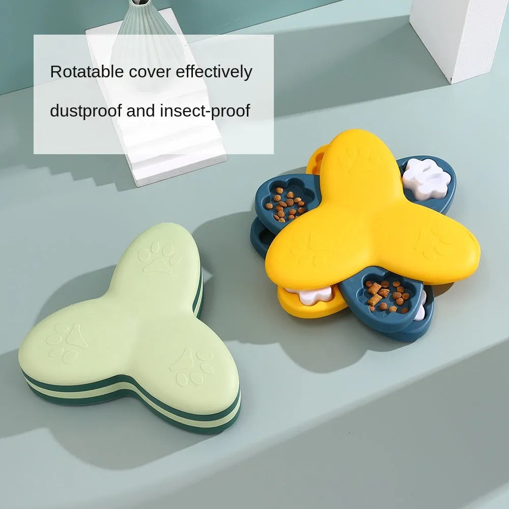Green and yellow dog puzzle toy with bone-shaped covers and non-slip base.