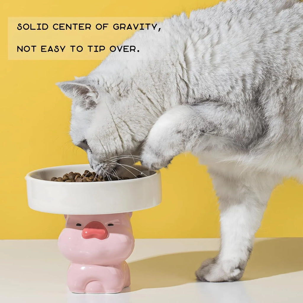 Raised ceramic cat food bowl in animal theme design, showing 12.5cm height and 15cm width.