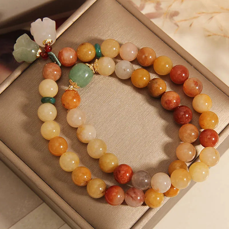 Natural Jinsi Jade multi-layer bracelet for women with orchid pendant on green background