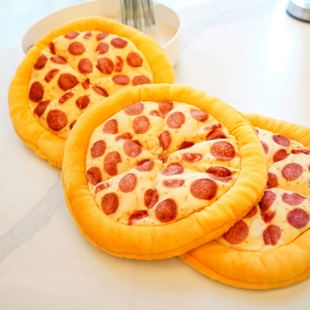 Yellow teddy pizza slice dog chew toy with textured surface and squeaker, 17 cm long.