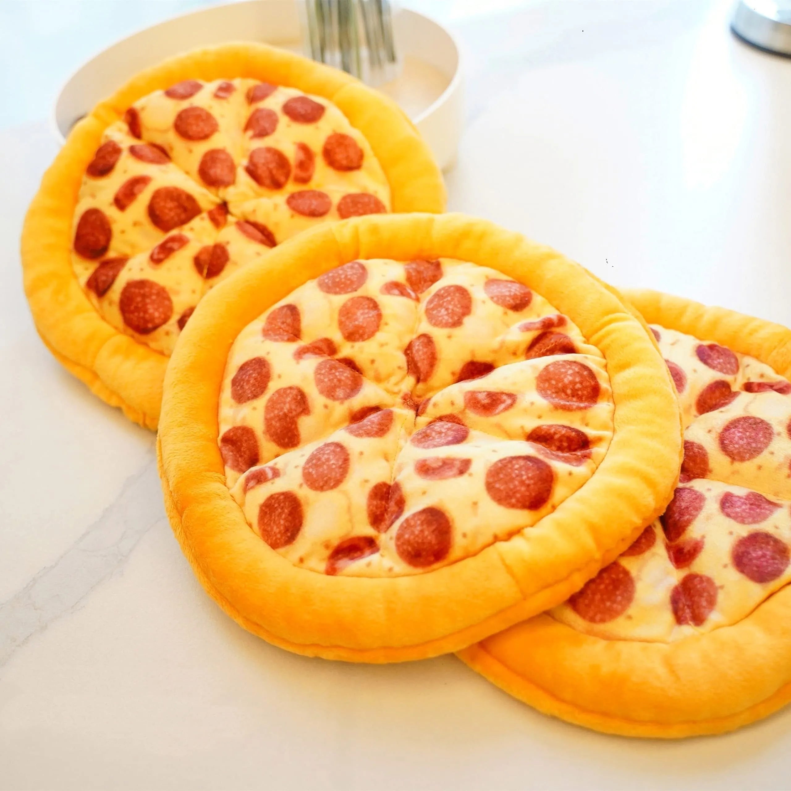 Yellow teddy pizza slice dog chew toy with textured surface and squeaker, 17 cm long.