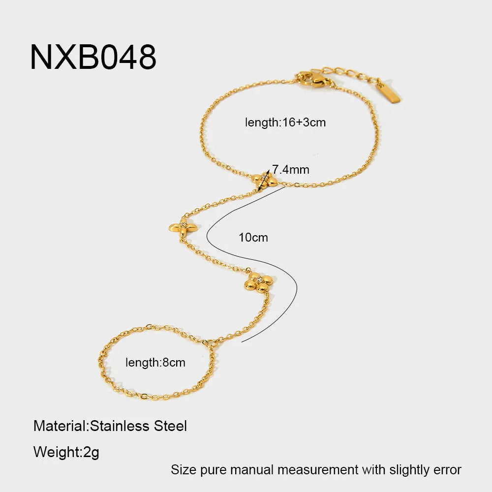 Women's gold stainless steel bracelet with geometric eight-pointed star and flower designs