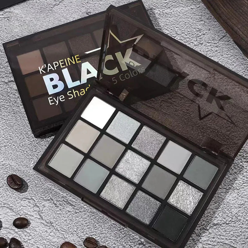 15-colour cartoon style eyeshadow palette showing brown, blue, and dark smoky matte and shimmer shades.
