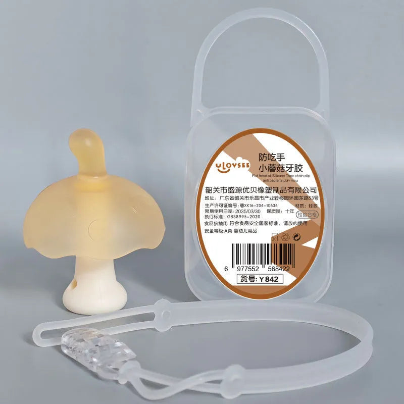 Small pink and nano colour mushroom-shaped silicone gel keychain charm on a transparent chain.