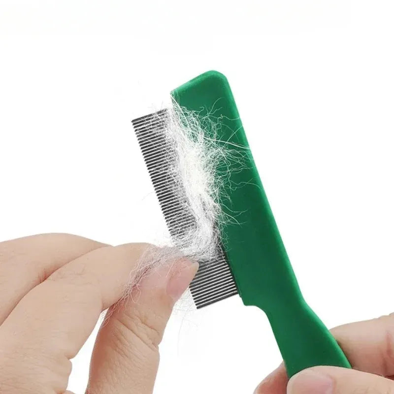Green plastic-handled pet comb with stainless steel pins for flea and hair removal.