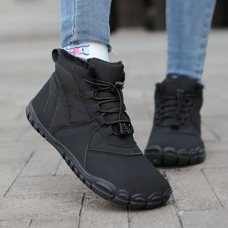 Outdoor snow boots in black with front lace-up, round toe, and rubber sole.