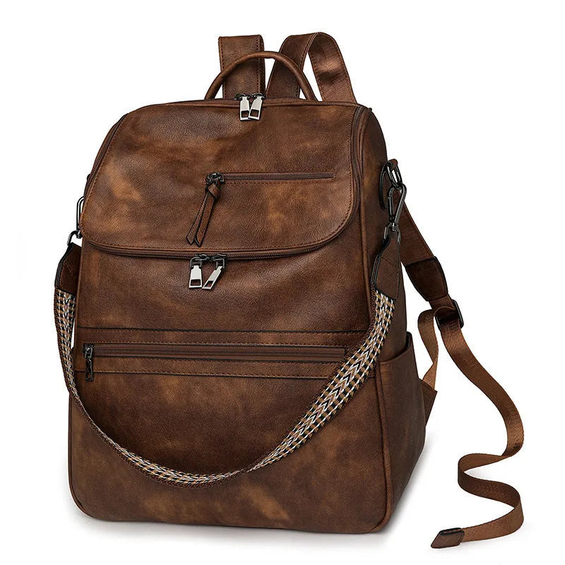Retro college student backpack in PU leather with curved shoulder straps and solid colour options
