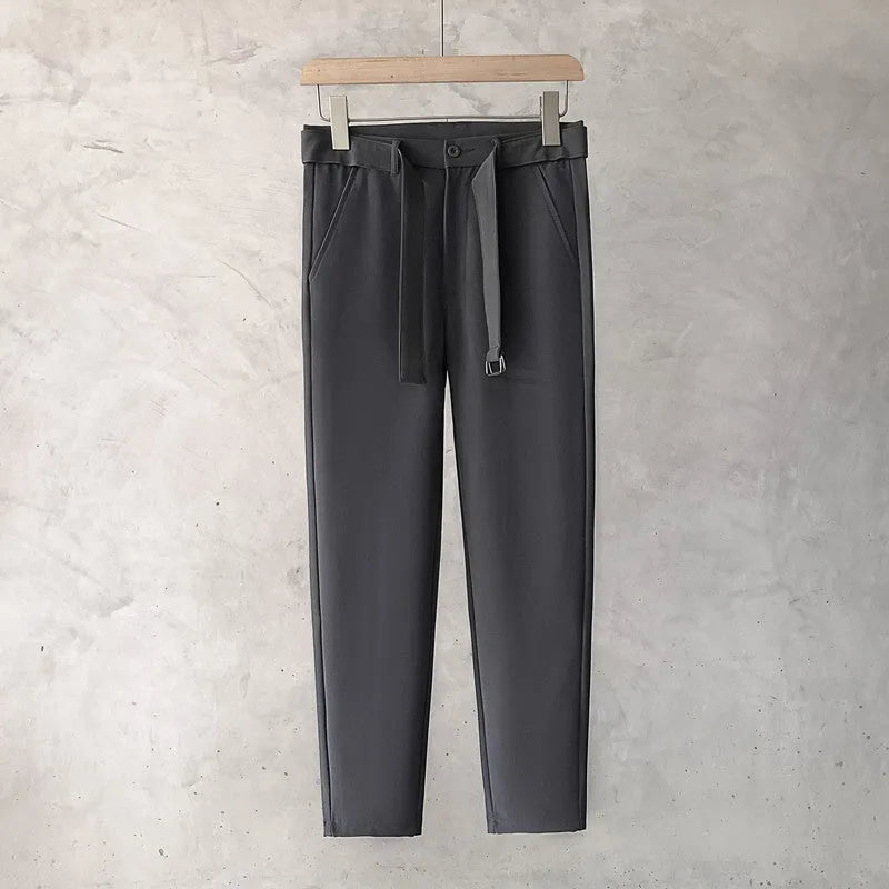 Boys slim straight wool trousers in grey, showing tapered fit and straight leg opening.