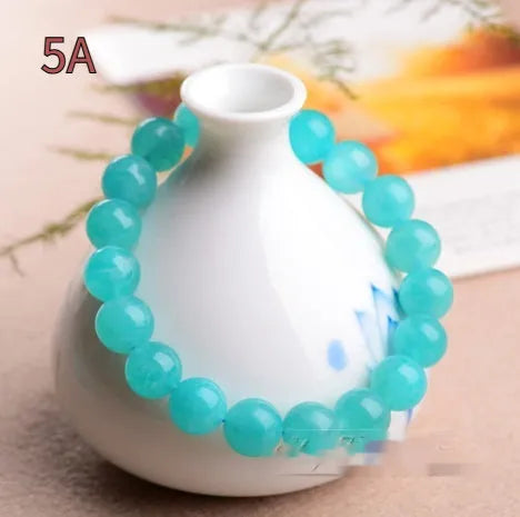 Natural Amazonite crystal bracelet with scattered polished beads in ice colour variations