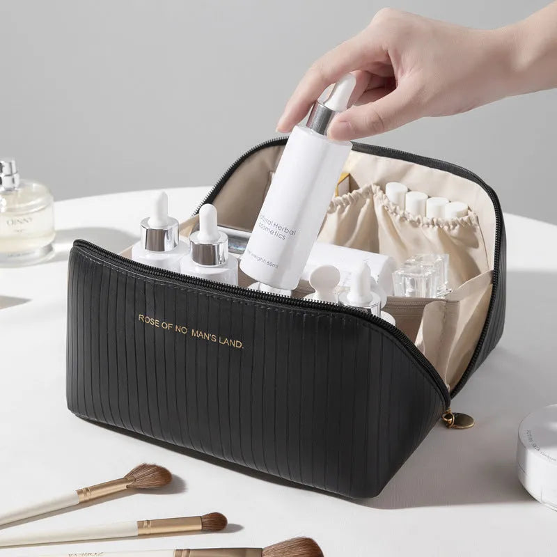 Vertical cubic pillow makeup bag in PU material with 22.5 cm height for travel storage