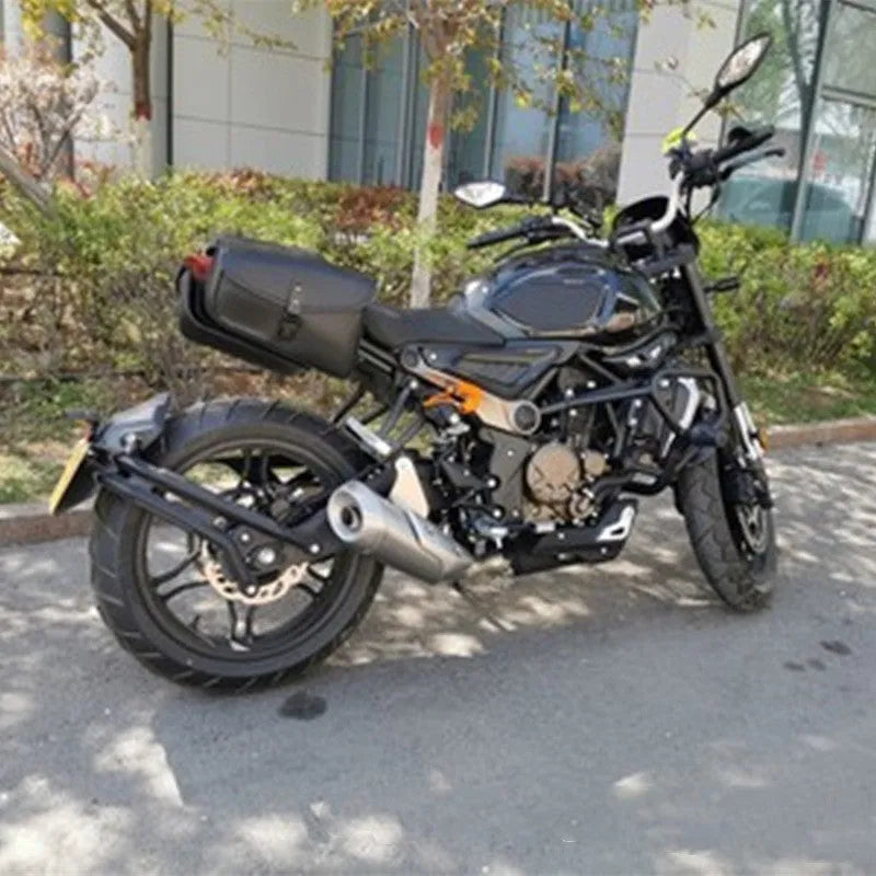 Black PU leather motorcycle swingarm saddlebag mounted on a Harley Sportster, showing side profile.
