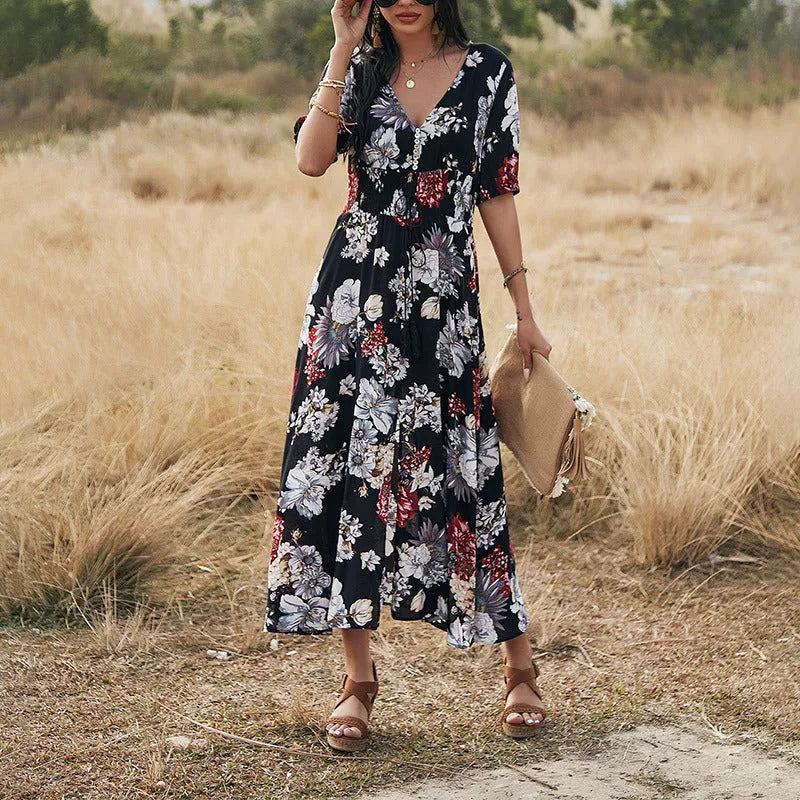 Yellow floral print women's summer dress with V-neck, short sleeves, and elasticated waist