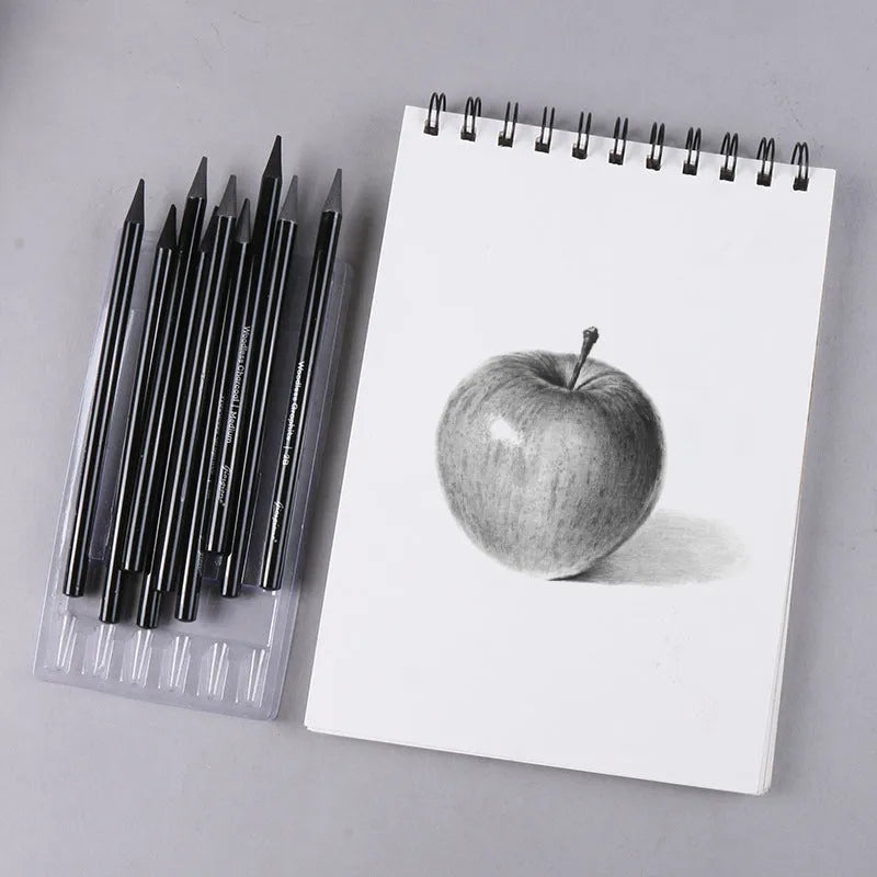 Graphite and carbonized wooden drawing pencils with solid lead cores on suction card packaging