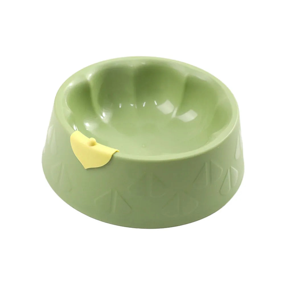 Green plastic double bowl for dog and cat food and water with anti-tip base.