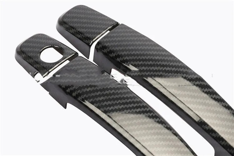 Carbon fibre pattern door handle trim for Opel Vauxhall Astra vehicles