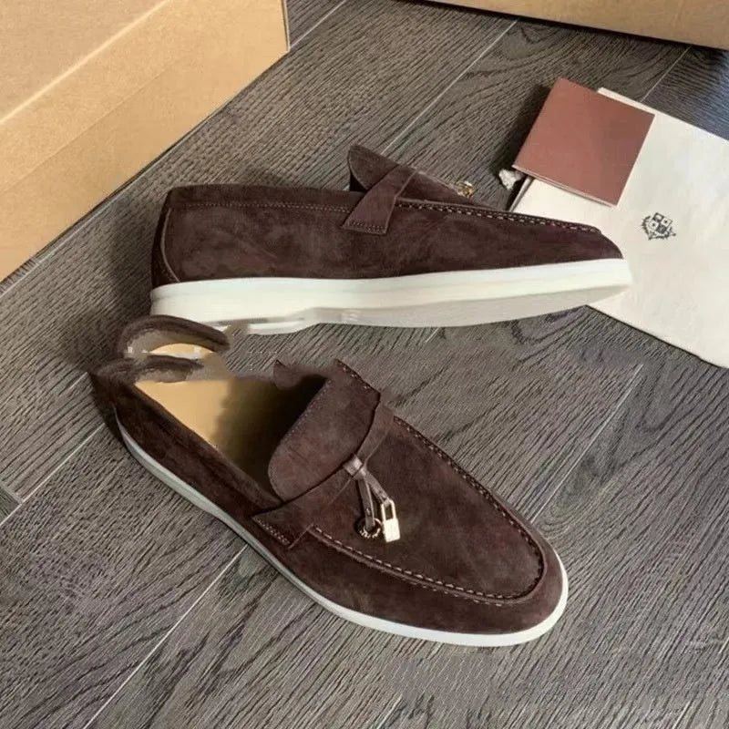 Unisex slip-on casual loafers with rubber soles in various colours on a white background.