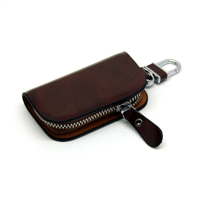 Genuine leather car key case with zipper closure in black or brown colour