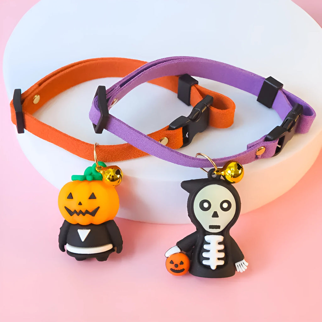 Halloween dog collar decoration showing luminous cartoon skull design on an adjustable polyester strap.