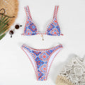 Retro four-colour print women's bikini swimwear in briefs style on a mannequin.