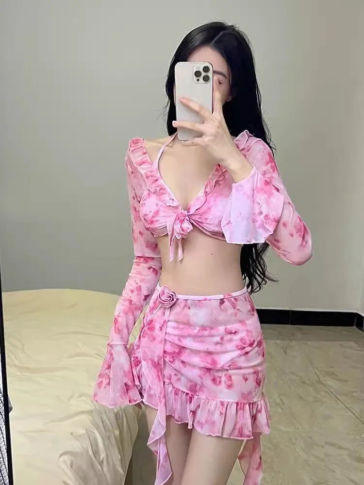 Women's cherry blossom pink floral bikini swimsuit on mannequin