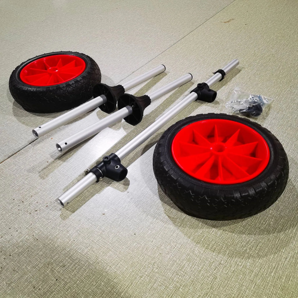 Foldable aluminium beach trailer for transporting kayaks and small boats on sand.