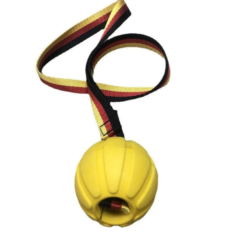 Yellow EVA floating dog ball with string attached, next to a camouflage coloured version on a blue background.