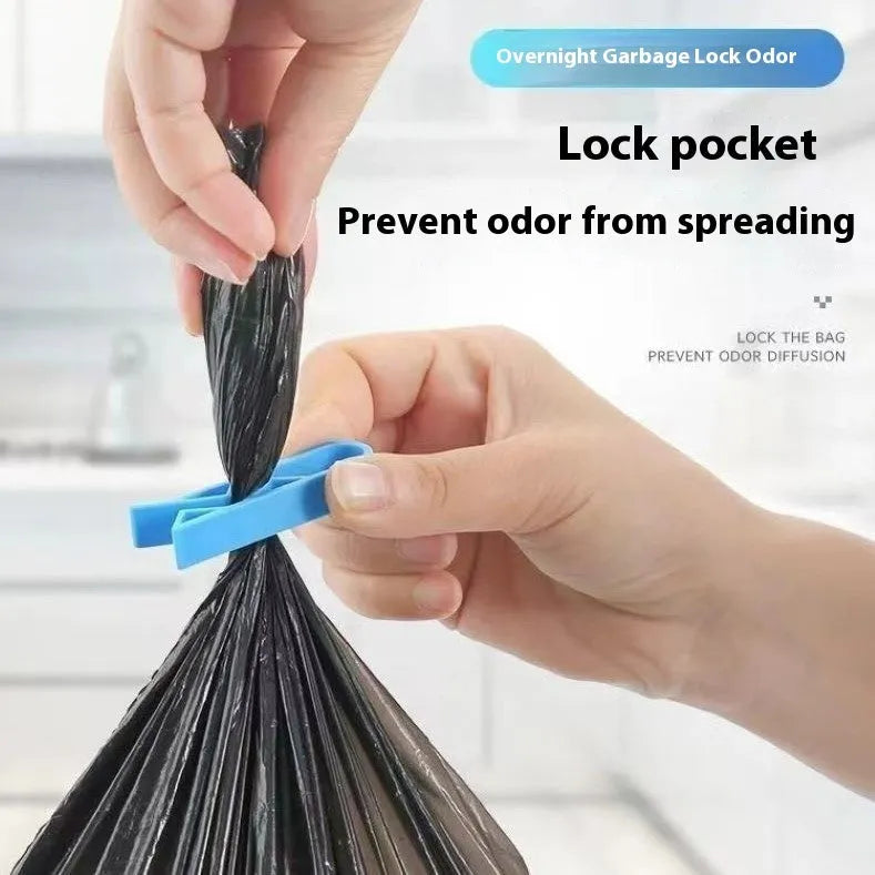 Non-slip plastic fixing clip for holding rubbish bags onto the side of a bin.