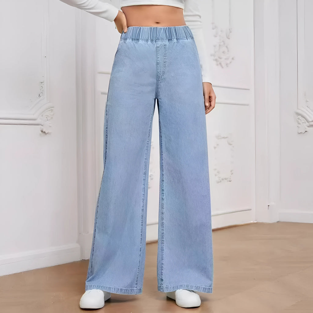 Plus size light blue washed denim jeans with wide-leg straight cut and mid-rise waist
