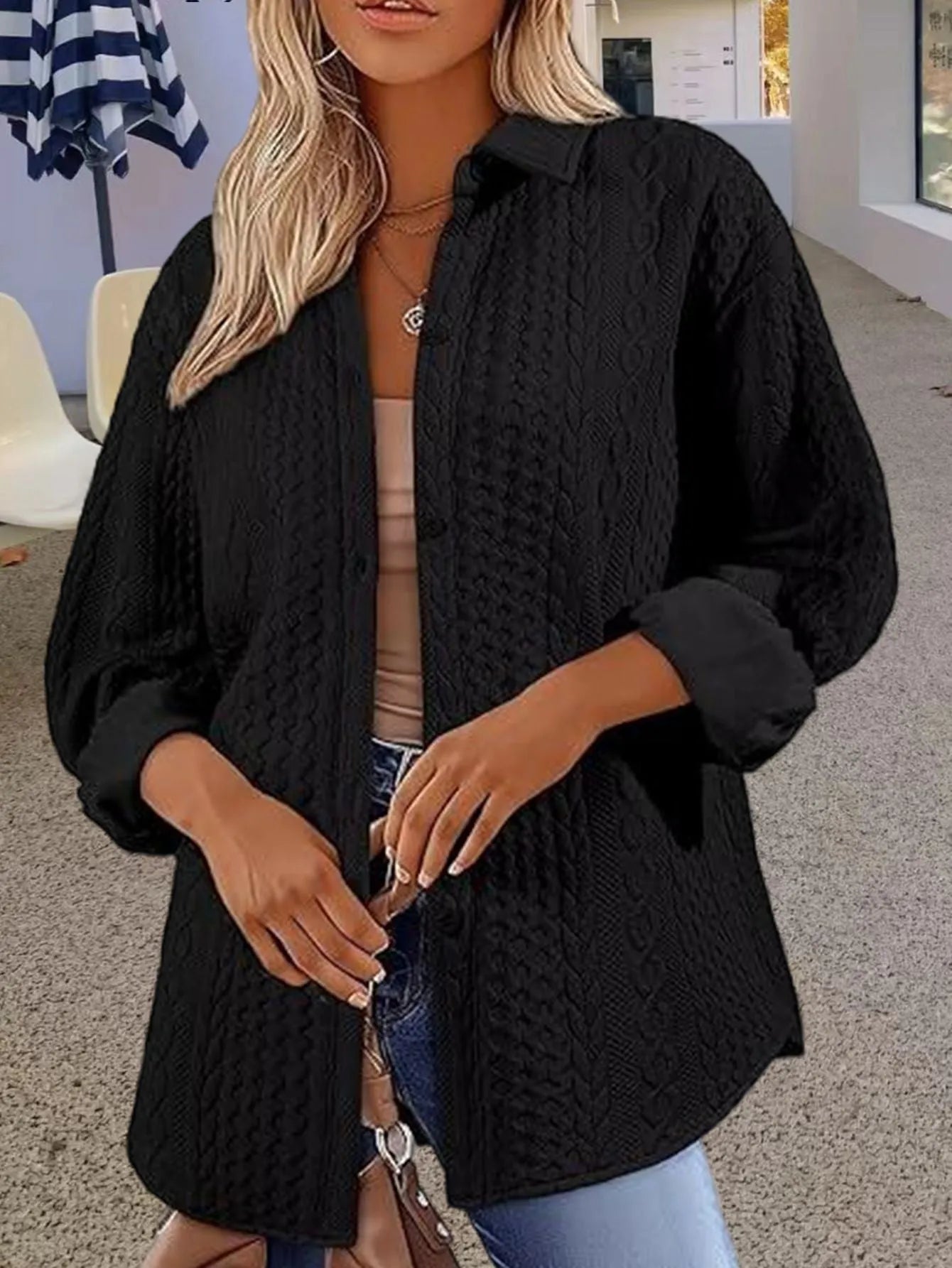 Women's long sleeve knitted cardigan in solid black colour with contrast detail