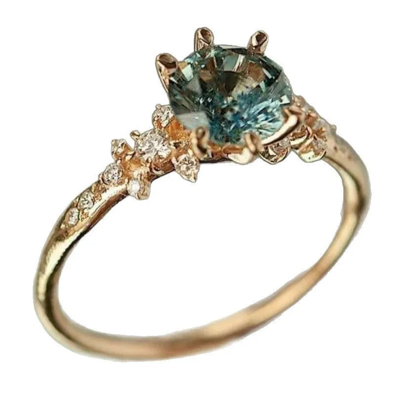 Geometric gold plated claw ring with micro inlaid zircon stones and chamfered square pattern