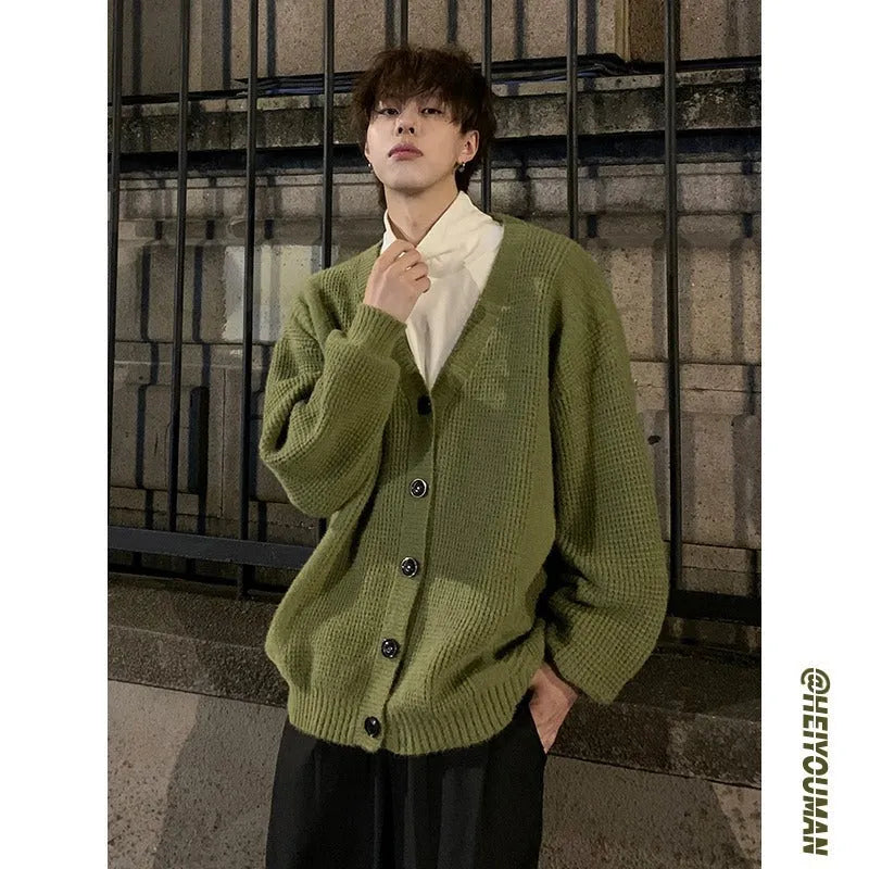 Men's army green loose fit v-neck cotton blend cardigan on a hanger