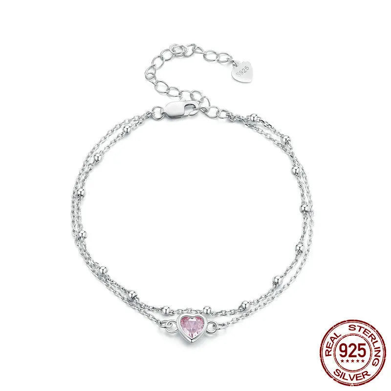 Women's sweet style 925 sterling silver bracelet with a small heart-shaped pendant on an adjustable chain.