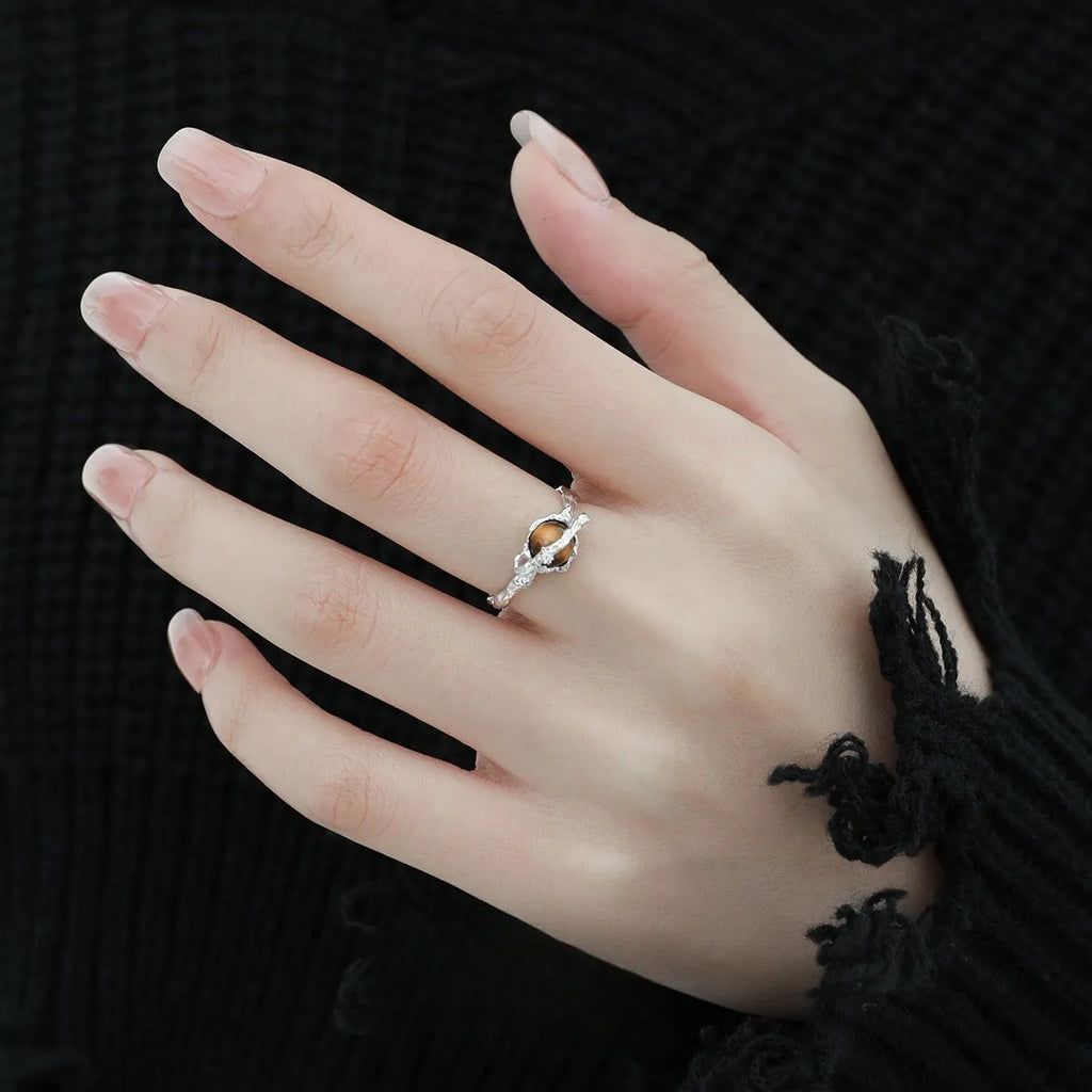 Adjustable opening women's ring with Saturn design in white gold colour electroplated silver