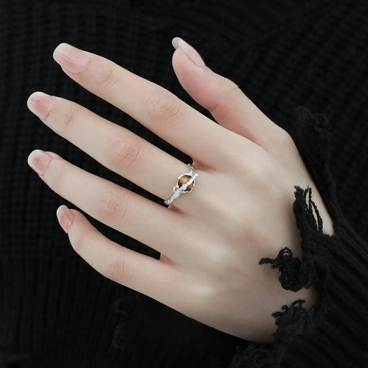 Adjustable opening women's ring with Saturn design in white gold colour electroplated silver