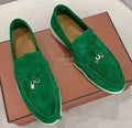 Unisex slip-on casual loafers with rubber soles in various colours on a white background.