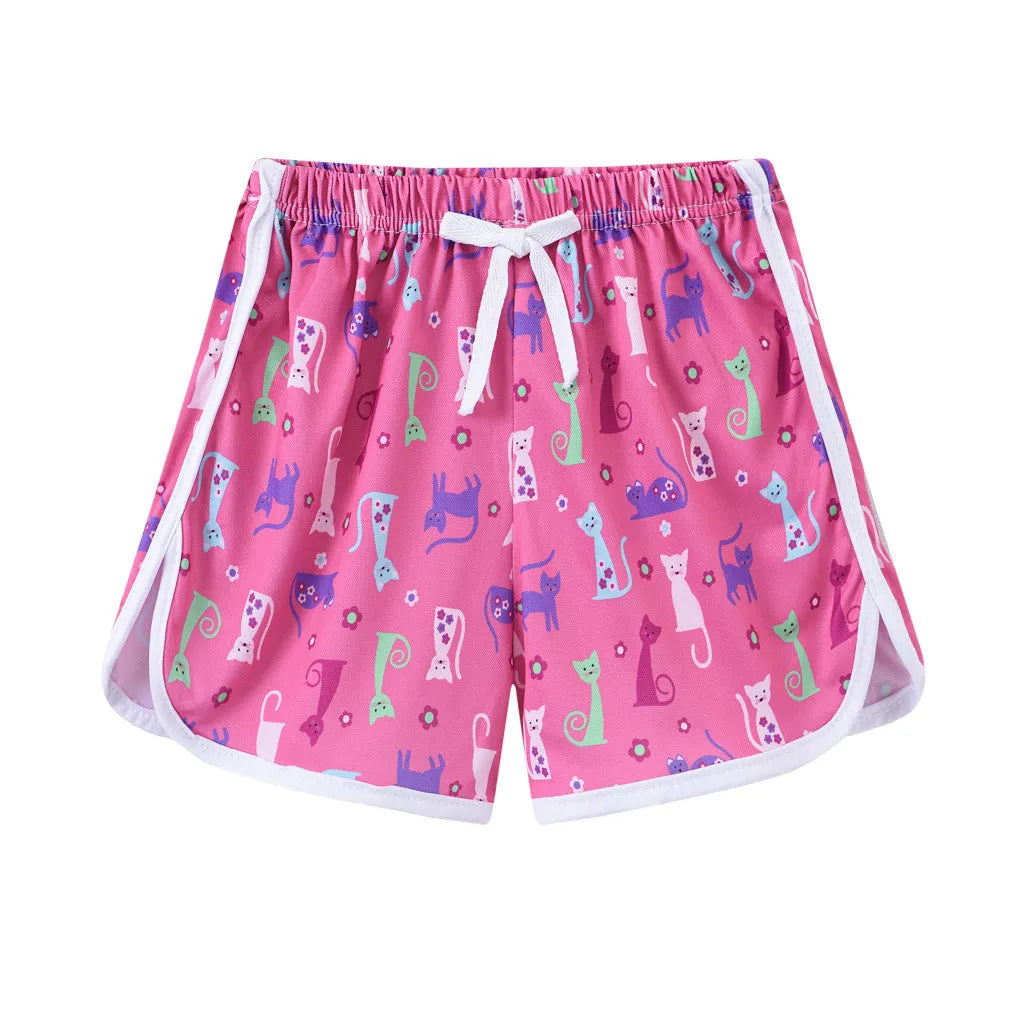 Children's polyester beach shorts in multiple prints and solid colours with size range 100-140cm