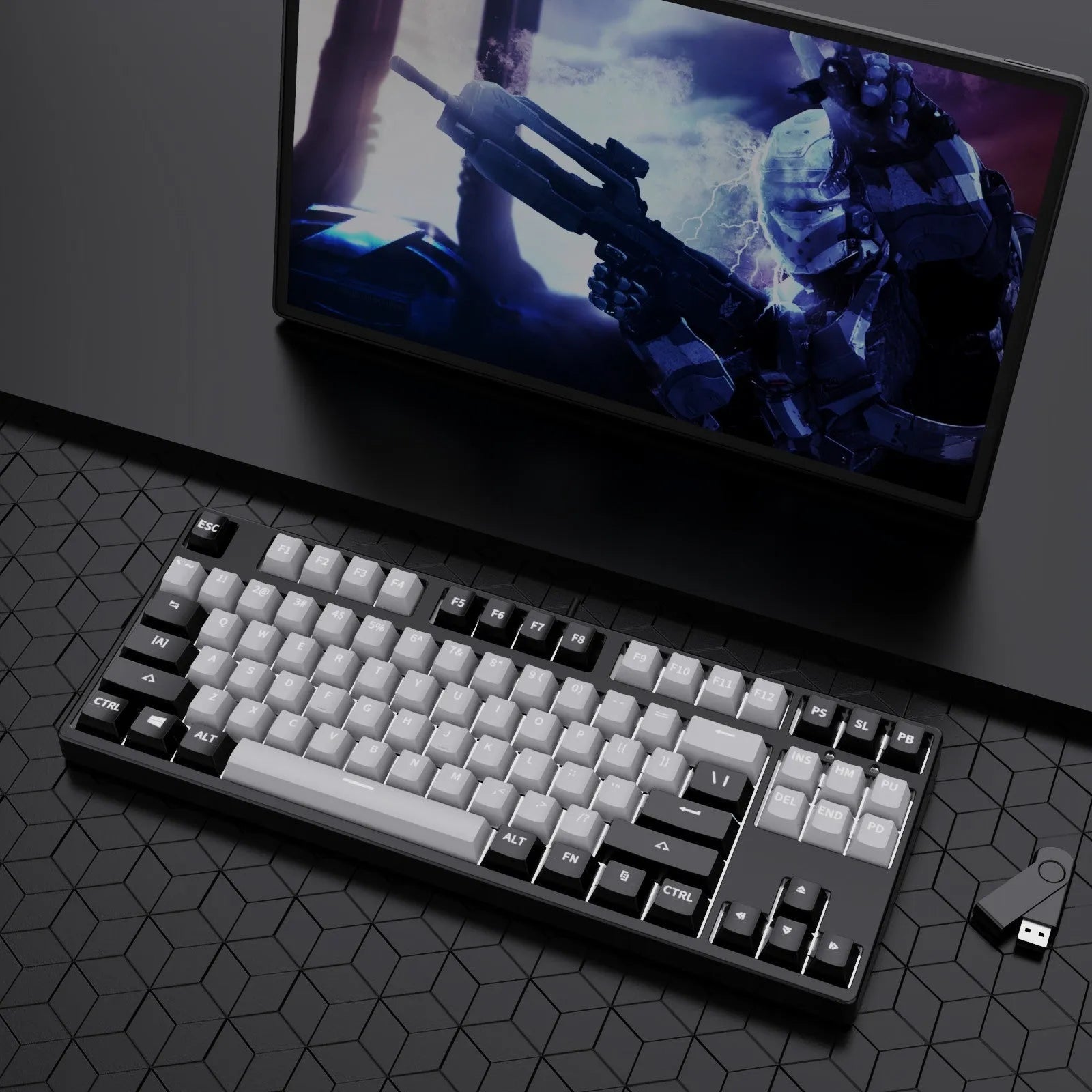 87-key wired mechanical gaming keyboard with multi-colour keycaps on a metal body.