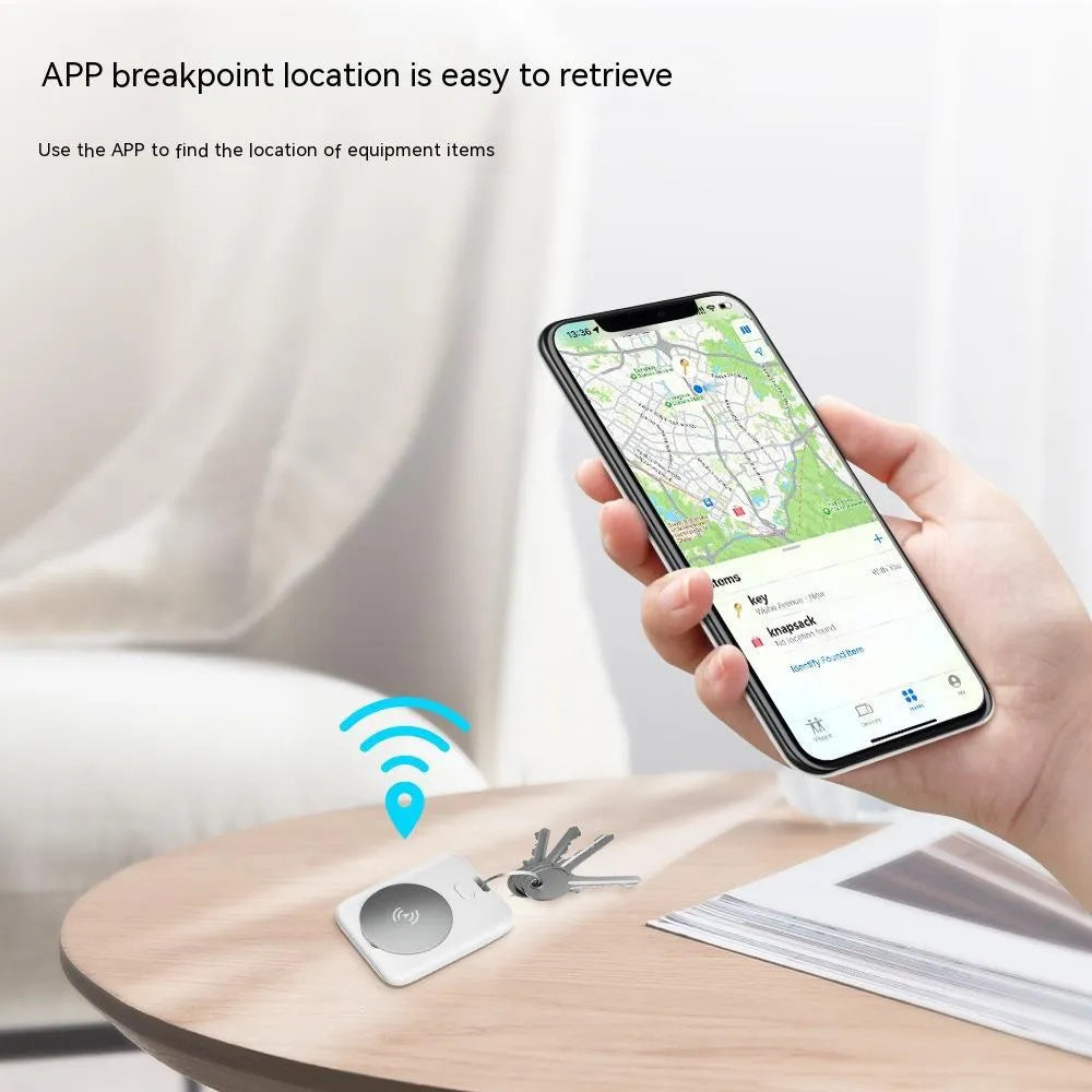 White ABS plastic smart anti-lost pet tracking device for Apple iOS users.