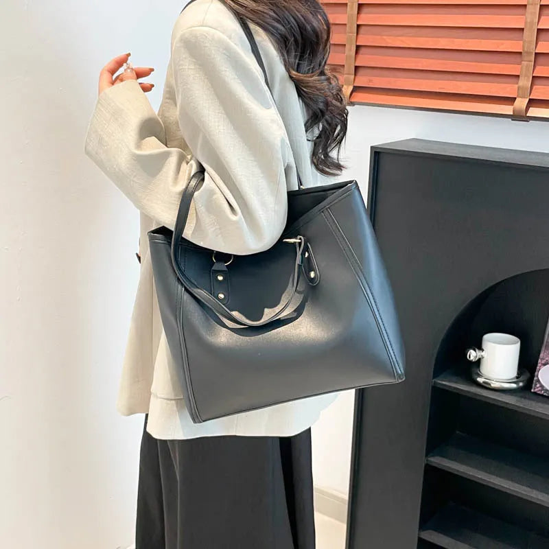 Korean style horizontal square shoulder underarm bag in PU material with a sandwich pocket.
