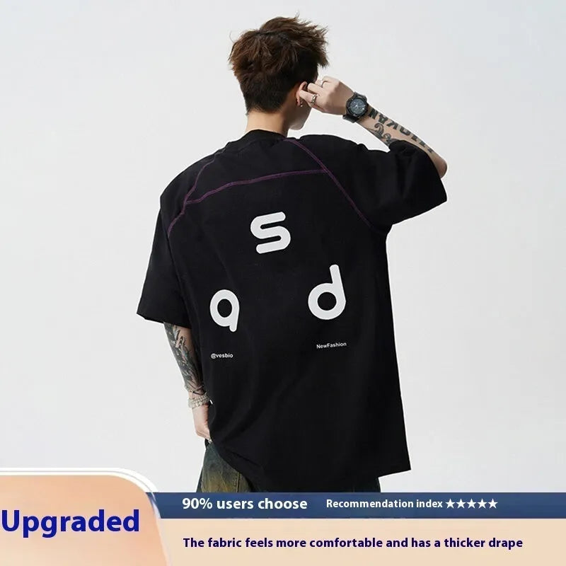 Men's loose fit cotton short-sleeve T-shirt with a printed letter design, shown in available colours.