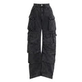Women's blue high waist wide leg denim jeans with multiple pockets on a neutral background.