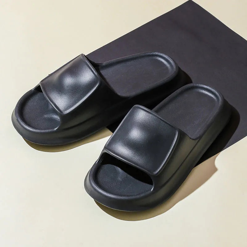 Thick-soled EVA flip-flop slippers in various colours on a white background.