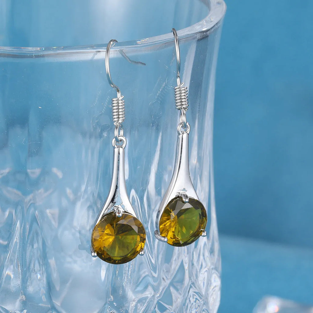 Olive green topaz drop earrings with water drop shape and gold electroplated finish