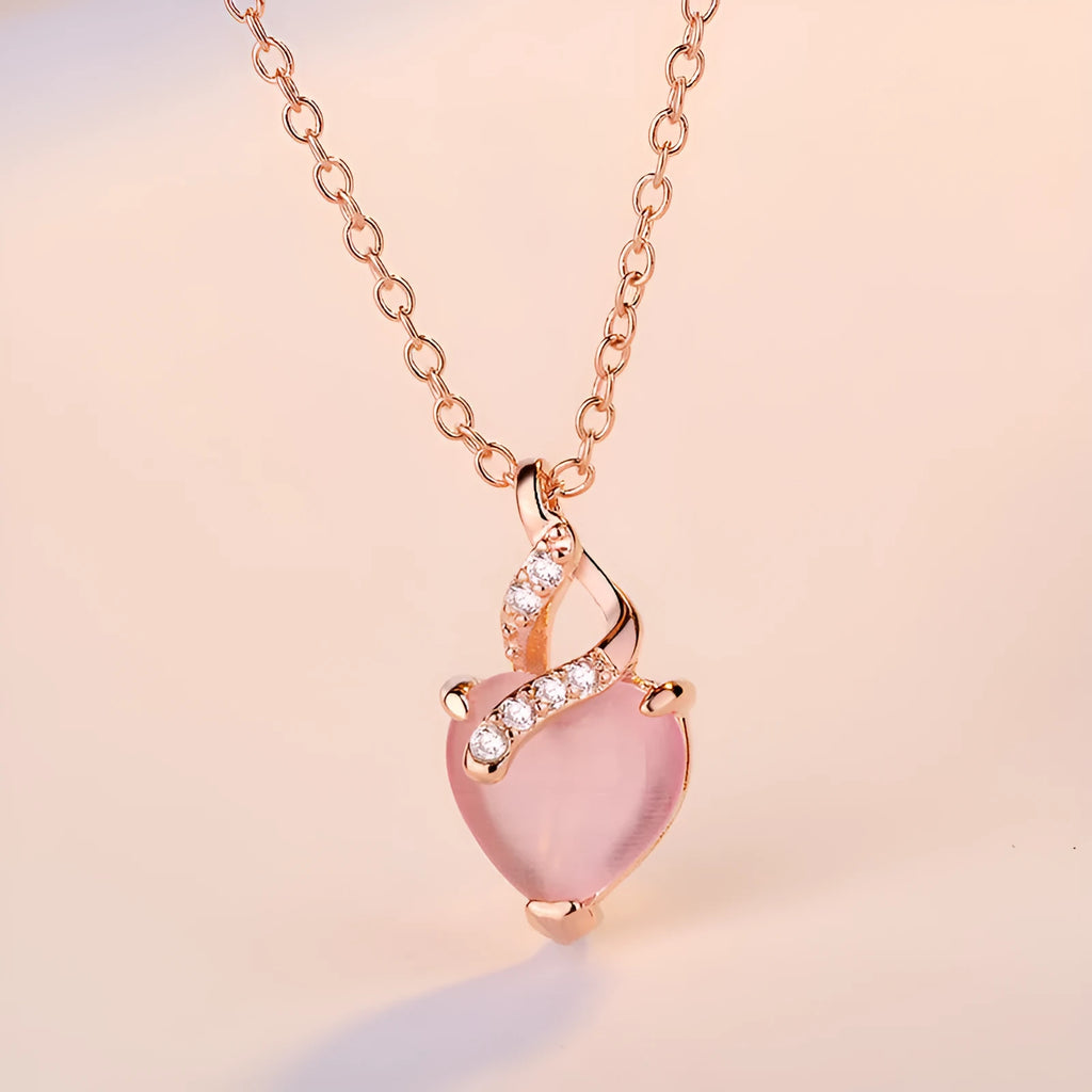 Women's heart-shaped pink crystal pendant necklace with rose gold cross chain
