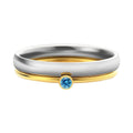 December birthstone titanium steel ring with geometric engraving, shown in gold and stone colours.